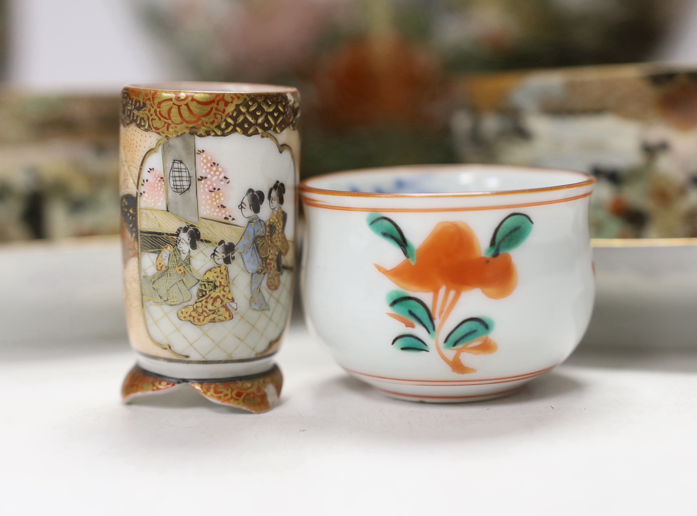 Japanese ceramics including an Imari bottle vase, a Satsuma vase and Kutani eggshell porcelain, tallest 22cm (8)